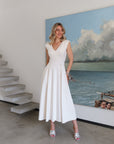 The Iconic Noefture V-Neck Midi Dress Off White