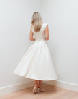 V-hals midi-jurk van Noefie in luxe stof, slow fashion design